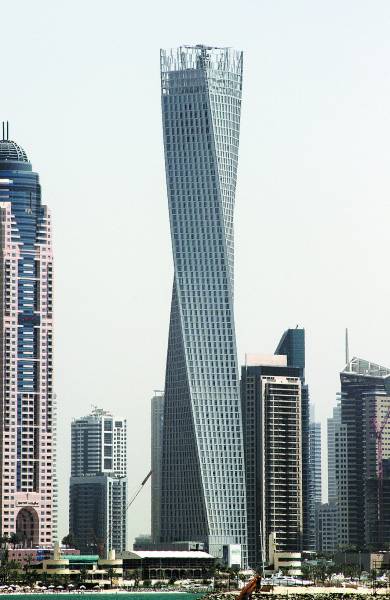 迪拜建成世界最高转体大厦 90度扭曲旋转(图)