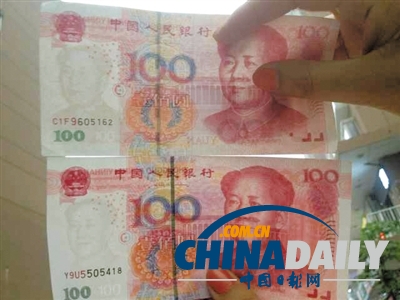 北京现C1F9开头百元假币 验钞机两次识别为真(图)