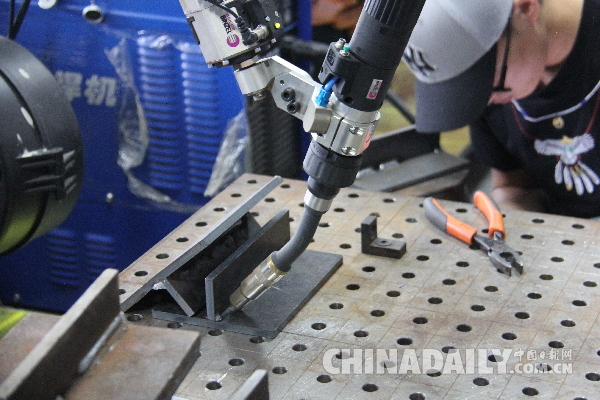 走进新时达机器人：深耕工业机器人的“工匠精神”